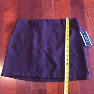 NWT women’s skirt from A Byer Size 11 wine colored